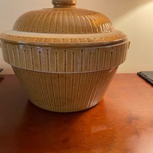 Vintage yellow ware covered bowl. Liquid capacity is 1 1/2gal.